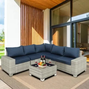 Outdoor Furniture Set With Table With A Light Grey Wicker Base and Navy Cushions and Pillows